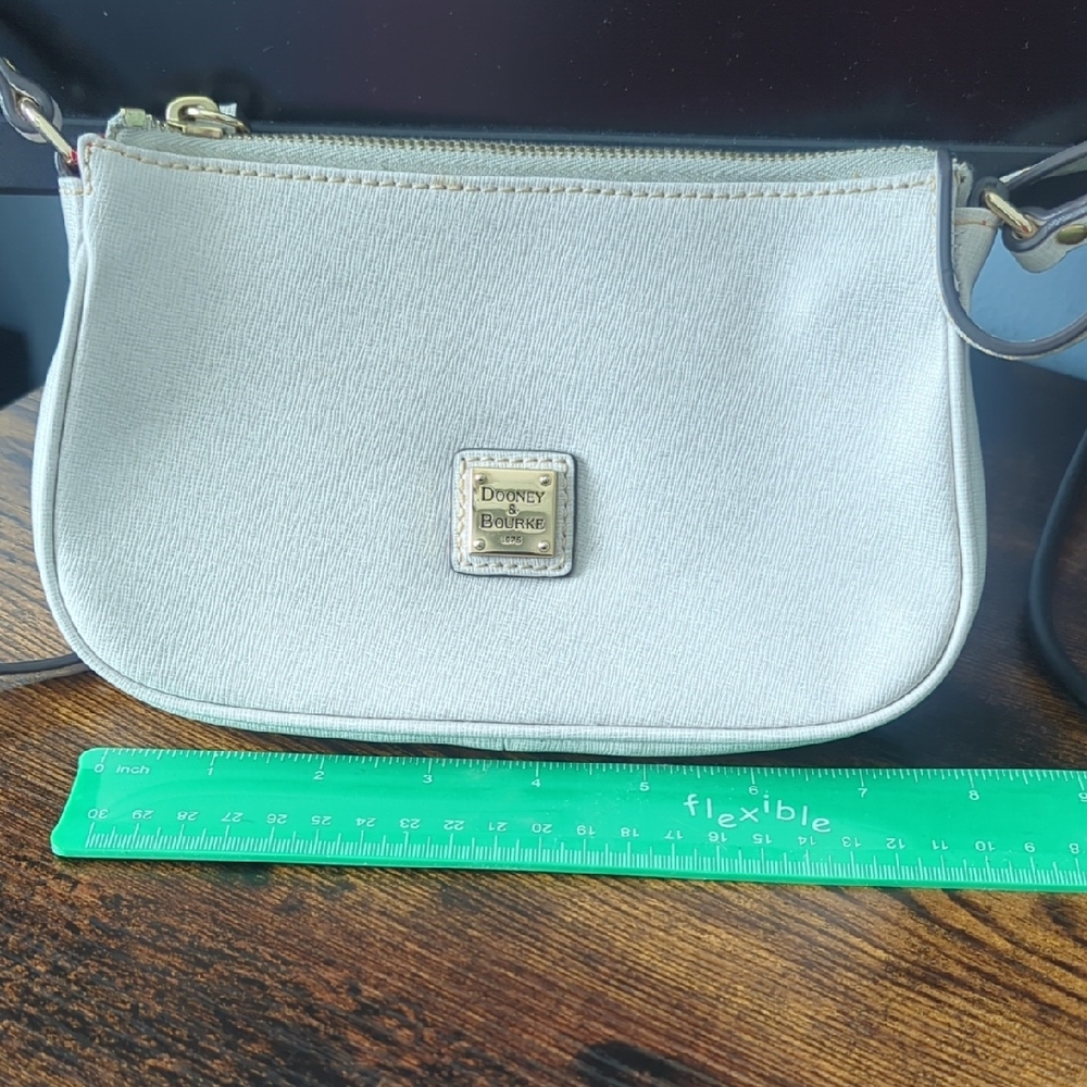 Dooney & Bourke Light Cream Crossbody Bag with Gold Plaque